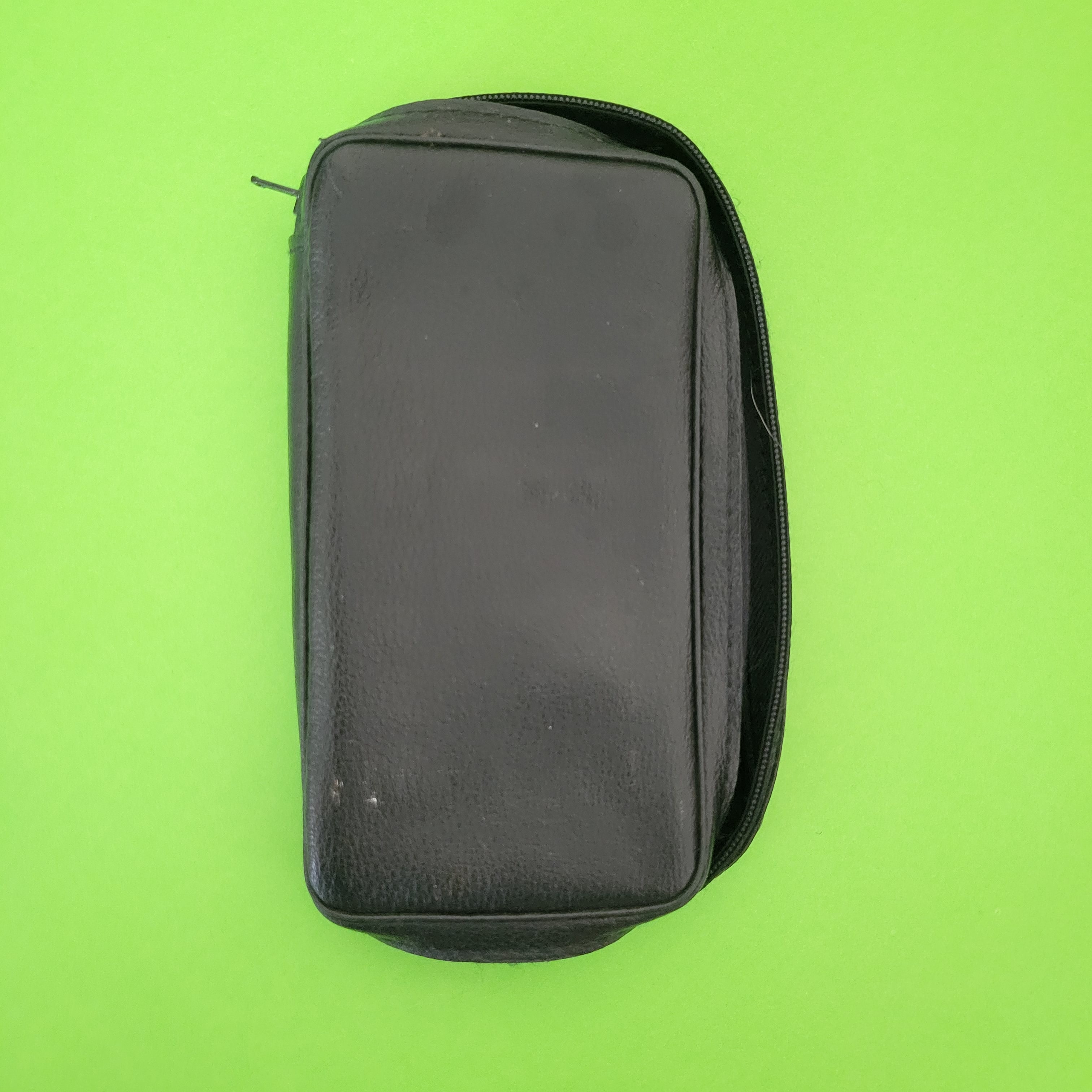 An image of the case of a I.T.C. four function + calculator